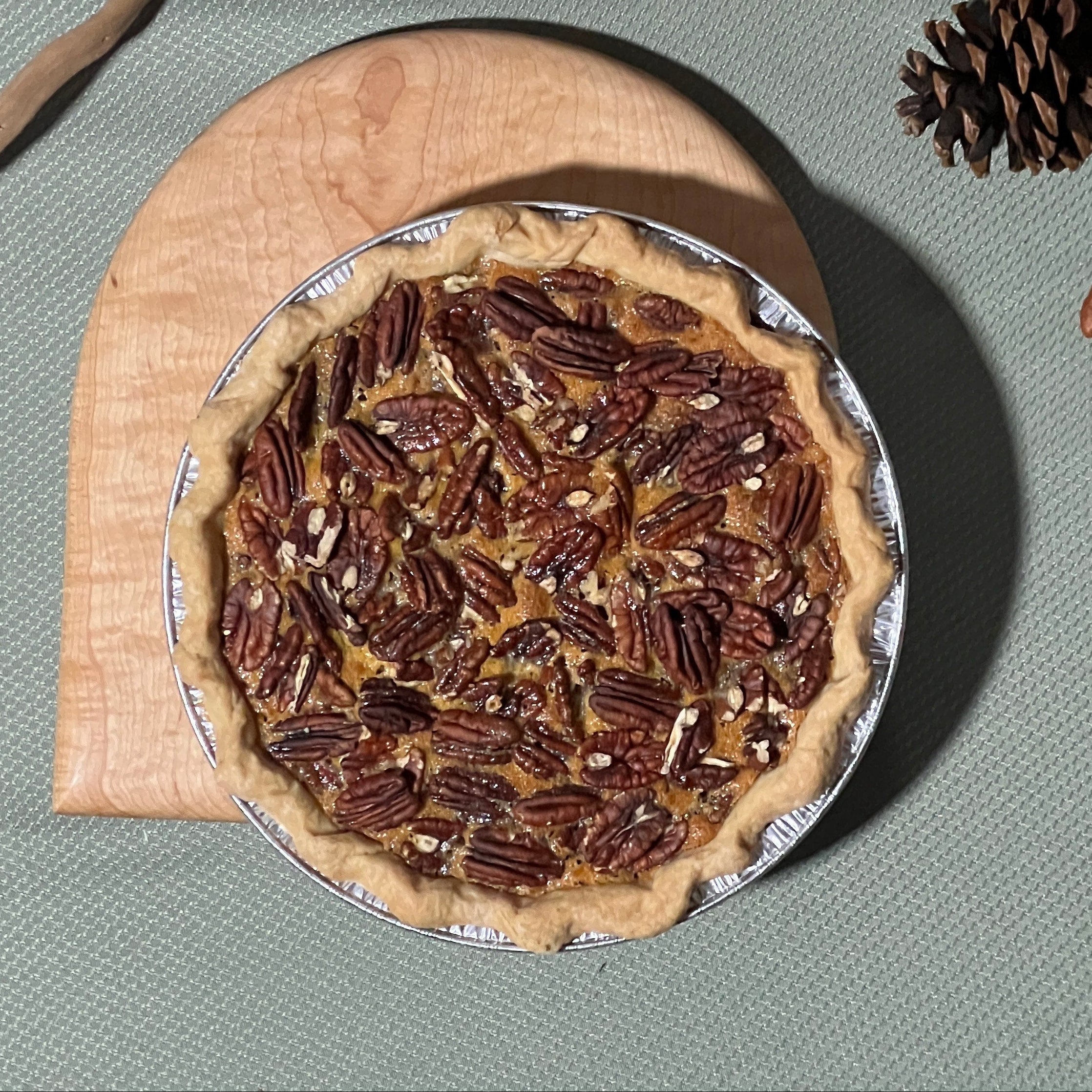 Our handcrafted Bourbon Pecan Pie combines toasted pecans, rich brown sugar, Kentucky bourbon, and pure vanilla in a buttery, flaky crust. Layers of caramelized nuts and silky filling create a warm, indulgent dessert with the perfect balance of sweetness, depth, and crunch. Serves 8–10 slices.
